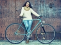 Adult woman with vintage bike